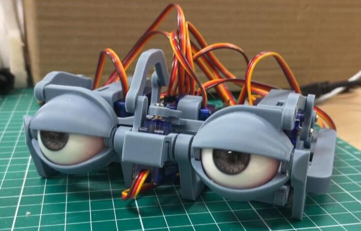 Eye mech (purchased from NMRobotics). Inserted into head build (eyelid pieces removed)