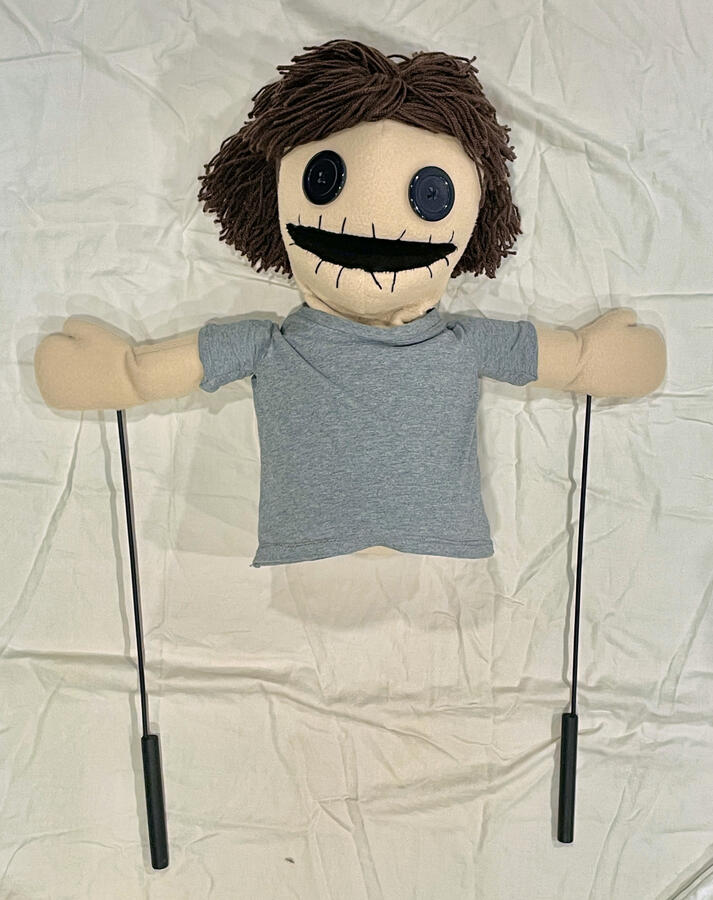 Assembled puppet with arm rods hands attached
