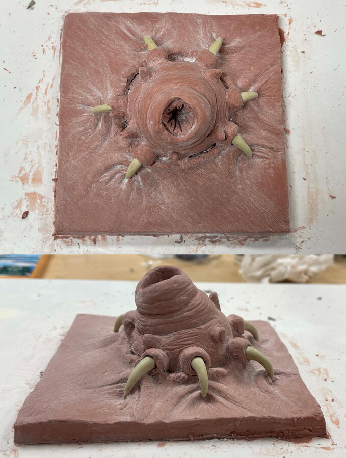 Chavant clay sculpt of creature and textured skin. Claw pieces made from sculpted milliput